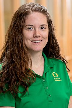 Profile photo of Tina Phifer wearing a UO-branded green polo shirt